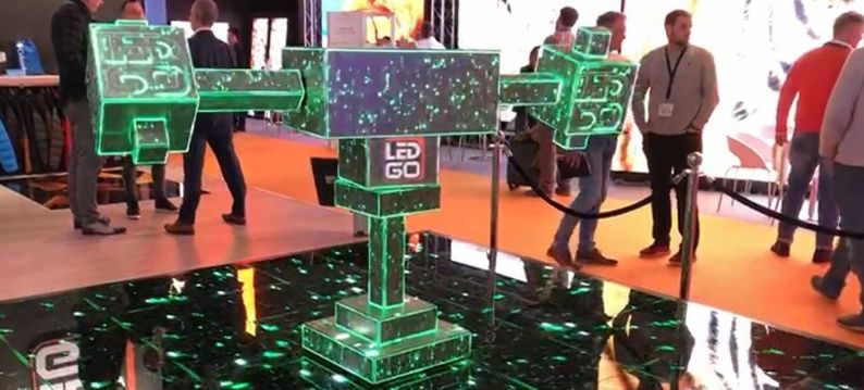 Demonstration of LEDGO LED panels at an exhibition.